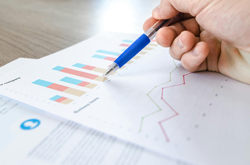 finance recruitment west midlands image with graphs on paper